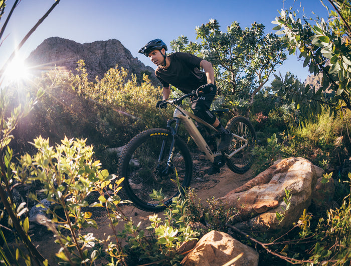 Outer Cycles The Link Ebike riding through rock garden at Banhoek